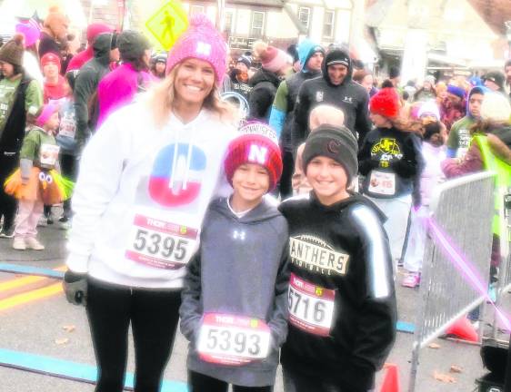 Ashley and Reese Osborn are shown with Connor Obertlik of Jefferson.