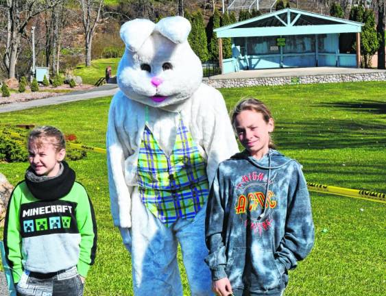 Desmond and Declan Tediashvill pose with the Easter Bunny.
