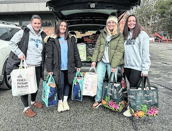 From left, Brianna Stafford, Tracy Burkholder, Janelle Ledyard, Melissa Wright. All are members of the non-profit’s board.