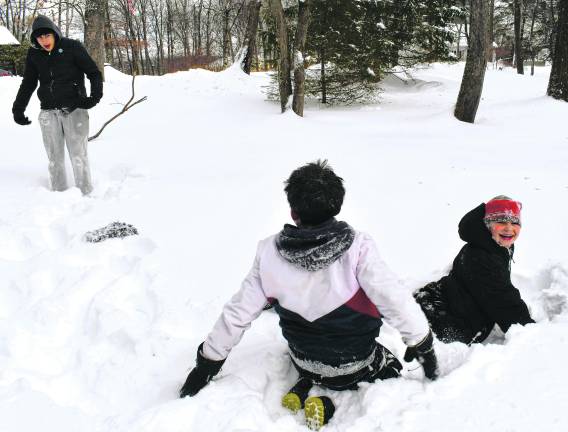Kris Kovic, Cole Morgan Roth and Kyle Canales, all of Sparta enjoy the snow.
