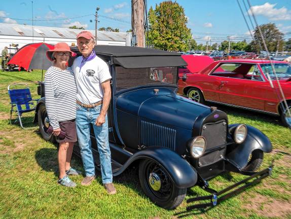 <b>Diane and Lance Sorchik pose by a 1928 Model A.</b>