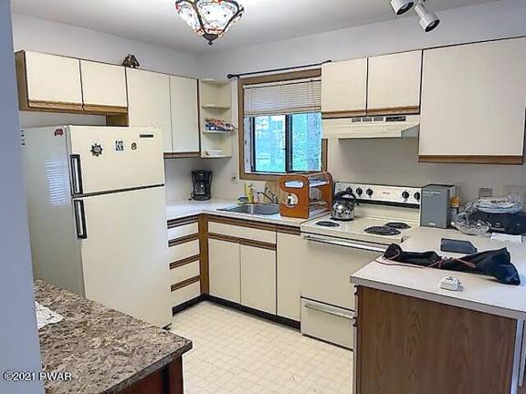 Escape to the country or live year-round with lake and pool access