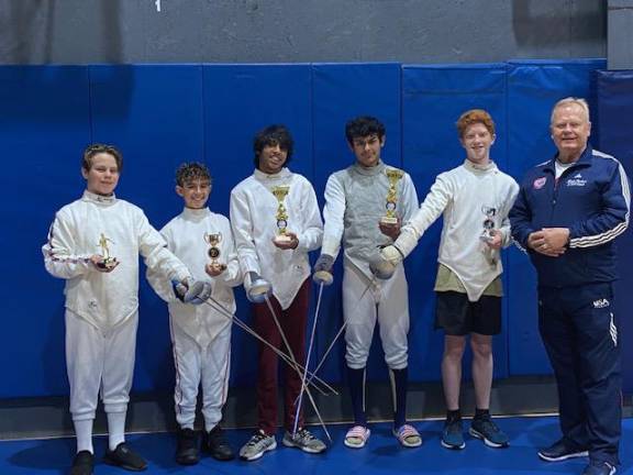 From left are fencers Raymond Galinski, Barber Devan, Aneesh Layer, Roman Concha and Adrian Appelbaum with their coach, Mark Trudnos. (Photo provided)