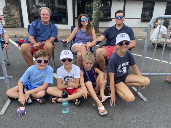 Among the parade spectators were, bottom row from left, Cash Said, 10; Ferris Said, 9; Goldie Said, 5; and Rosie Said, 10, all of Madison, and, top row from left, their grandfather, Jerry Thompson of Sparta, and parents, Courtney and Darius Said of Madison.