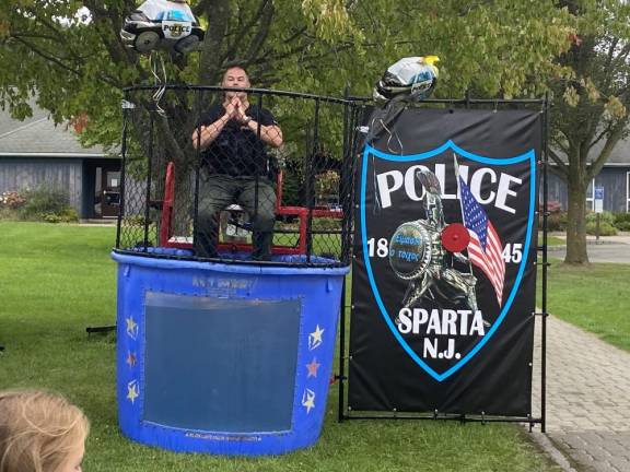 Lt. Adam Carbery of the Sparta Police Department prepares to be dunked.