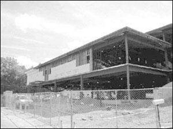 Work on municipal building resumes - Project is almost a year behind schedule