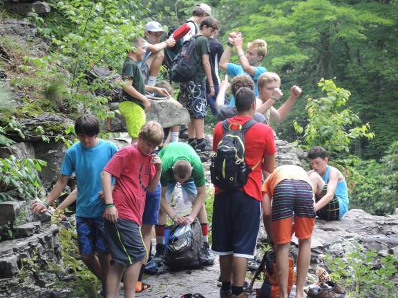 Troop 150 hikes to Fossil Rock, a water hole and jumping location on the Bushkill River