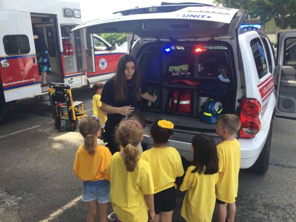 Sparta Ambulance Squad gave the children a tour of an ambulance and talked to them about when to dial 911
