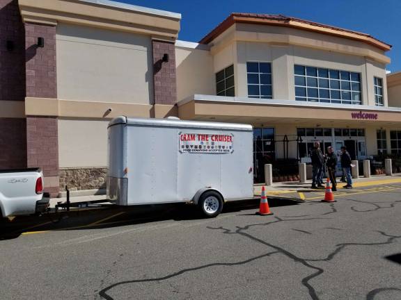 'Cram the Cruiser' by cramming the trailer with bags of food