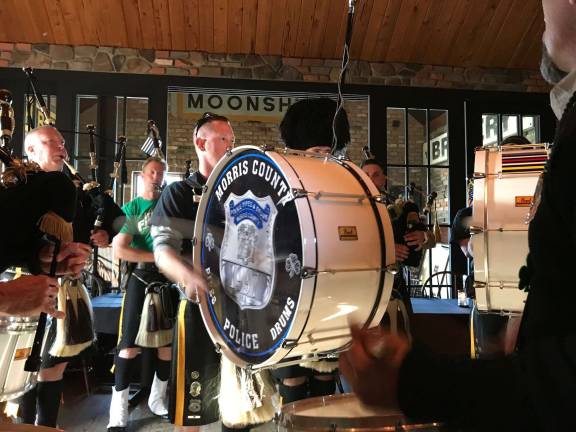 The Morris County Police Pipers &amp; Drummers came marching in Photo by TOP