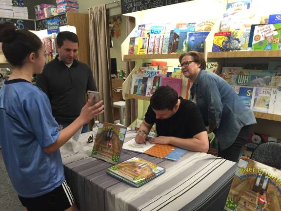 Local shoppers stop in to Sparta Books to meet Chris and Caroline Manzo of Bravo's Manzo'd With Children.