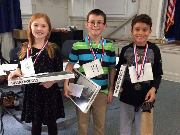 The three winners, from left, Evelynn Austin, Gregory Marino, Vaiden Pollard