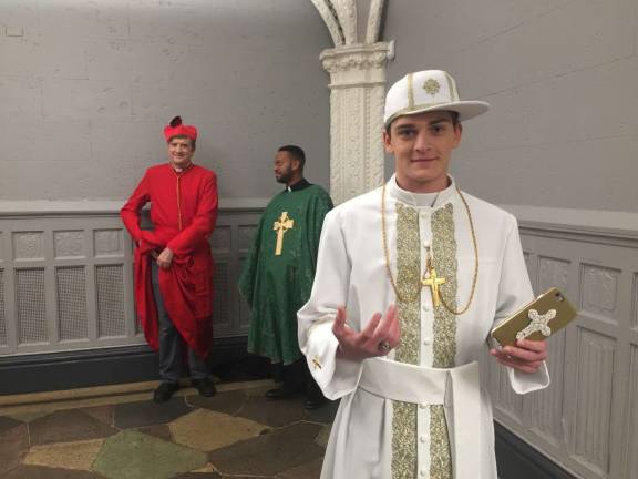 Sam Jules as 'The Young Pope' for an appearance on Steven Colbert's show