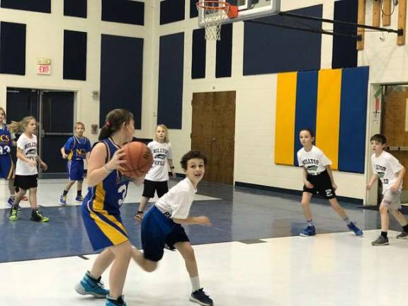 The Hilltop Hawks played their first basketball game earlier this month Photos provided