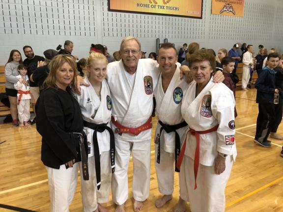 Celebration after the promotion. From left: Jackie Klinger, Brooke Klinger, Shihan Nick Adler, Sensei Scott Klinger, and Marilyn Fierro. (Photo provided)