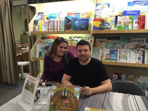 Eva Romei a fan gets a signed copy of reality TV star Chris Manzo's new book at Sparta Books.