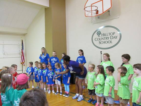 Children singing the Safety Village song.
