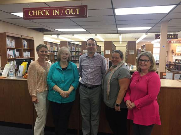 Sparta Public Library staff, from left:Grace Lane, Diane Lapsley, Dave Costa, Jennifer Cristillo and Patty McCormick. Photo by Rose Sgarlato