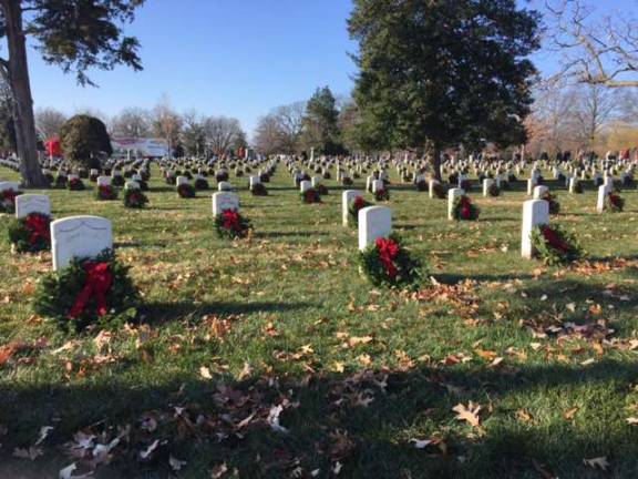 Wreaths wwewre laid at Arlington and over 1,200 other sire here and abroad