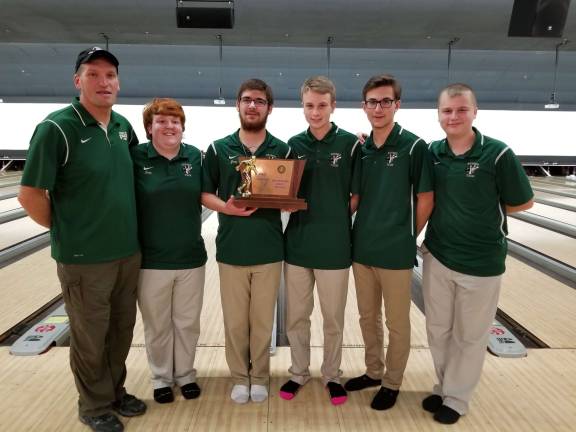 Photos provided Sussex Tech Mustangs Coach Chad Gasoriek celebrates state championship win with bowling team members Daniel McNeely, co-captain Joey Steele, co-captain Patrick Danielson, Matthew Grey, and Matt Danielson.
