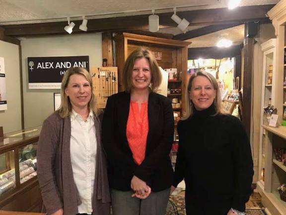 Kate McNamara Esq. (center), April Showers honoree, flanked by Stephanie Koza-Austin and Jennifer Koza-Todaro, owners of the Chocolate Goat and board members of Birth Haven. photo provided