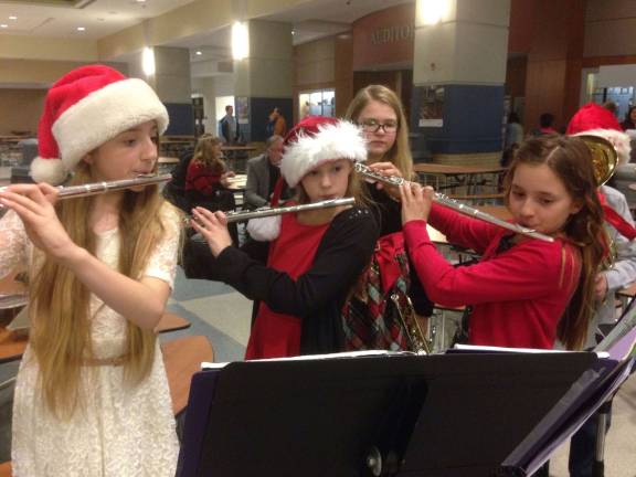 Flute Trio: From left, Lena Podbielski, Erin Takach and Ava Mazzarella.