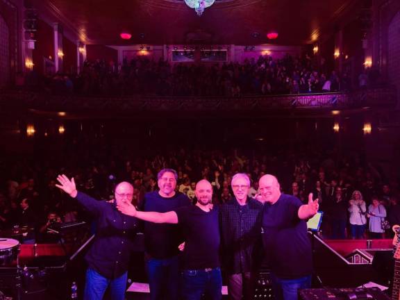 The Genesis Show recreates the Phil Collins era of Genesis on Saturday night at the Newton Theatre. (Photo courtesy of the Genesis Show)