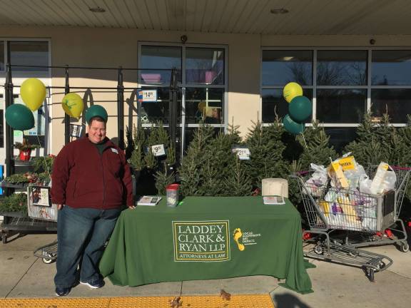 James Quiggle collecting food for the needy