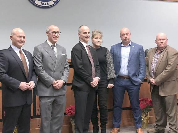 Sparta council members pose for a photo at the reorganization meeting Jan. 5. From left are Dean Blumetti, Neill Clark, Daniel Chiariello, Christine Quinn and Josh Hertzberg. At right is acting Township Manager Grant Rome.