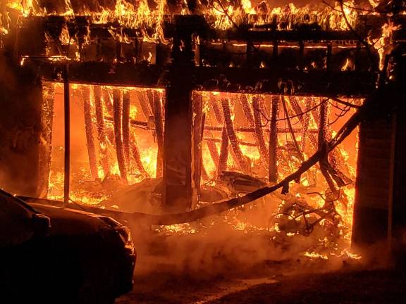 A fire at 127 Old Prospect Rd. in Sparta, seems to have started in the garage area, Sparta Police said. The residence was a "total loss" and initially the investigation was made especially challenging due to frigid temperatures and water freezing over. (Photo provided by Sparta Police)