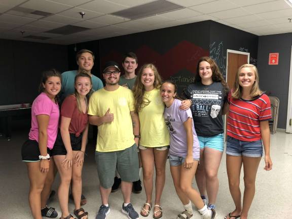 From left; Charlotte, Sydney, Kevin, Michael Misukonis, Brenden, Grace, Mikayla, Taylor and Sophie