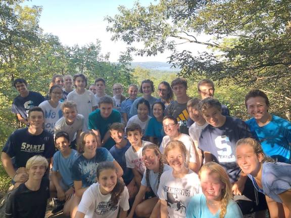 Sparta High School Cross Country runners at the top of Sparta Glen after a trail run.