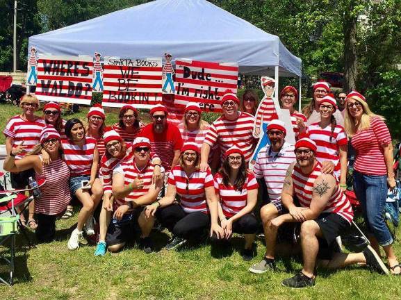Sparta Books Dragon Boat Race team, all dressed up as you-know-who