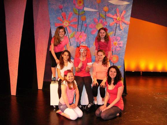 Photo Credit: Danny Campos Emily Portune (Pinkalicious) and the Cupcake Ensemble.