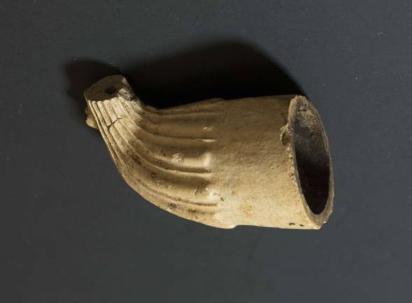This clay pipe was found in the basement of the Van Kirk Homestead in beds of soft, dry, preserving soil under old floorboards. Photos by Nancy Madacsi
