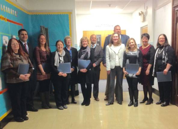 From left: Christine Aloisio, Giuseppe Leone, Kaitlyn Bird, Lara Lovett, Janet Ferraro, Sandra Chiappini, Douglas Layman, Laura Trent, Dr. Daniel Johnson, Stephanie Delpome, Judy Zoeller and Margaret Trump.