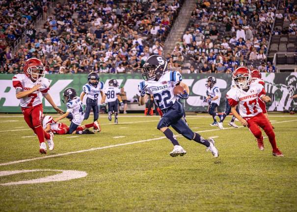 3rd grader, Quinn Klebez, on his long run for a touchdown.
