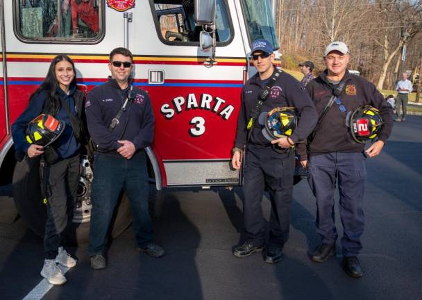 Firefighters, from left, are Lucienne Wolfson, Brian Pumo, Samir Saba and Howard Fisher.