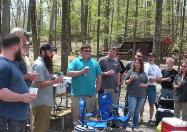 Members of MASH-NJ and SCUBA listen to MASH-NJ President Karl Weiss deliver a toast in honor of National Homebrew Day, Saturday, May 5, 2018 at the Great Divide Campground in Andover. It's estimated that 200,000 homebrew enthusiasts took part in the 1 p.m. EST synchronized toast nationwide.
