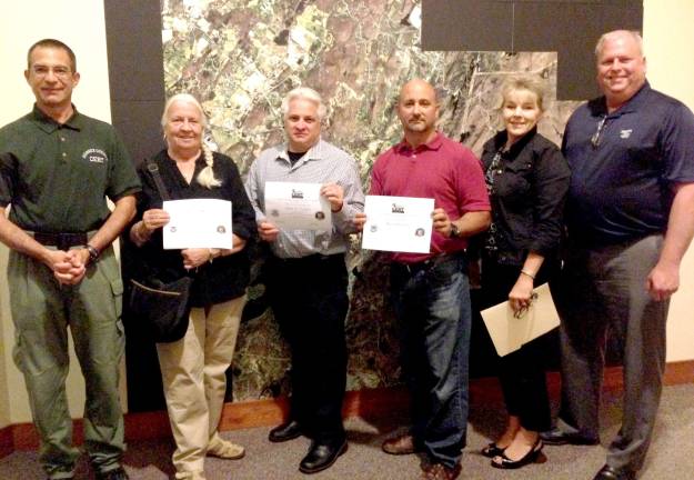 CERT graduates, from left, are shown: : Alex Kloian, Helen Predmore, John Vesper, Kevin Lynch, Deputy Mayor Christine Quinn, Chief of Police Ernie Reigsted.