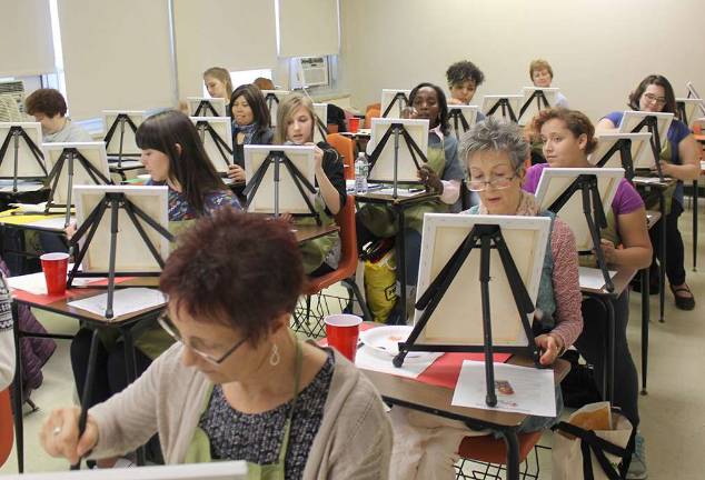 Last year’s LSR attendees enjoy a painting workshop during the day. Photo provided