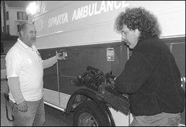 Sparta Volunteer Ambulance's Paul Koteras, left, rehearses a scene while AVATAR's Director of Photography Paul Jacobson frames the shot.