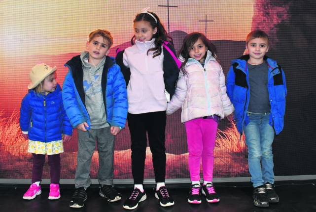 Audrina and Henry Den Dulk are shown with Cassie, Charlotte and Cooper Hayden, all of Sparta.