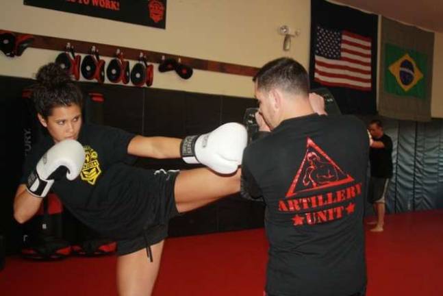 Photos by Rose Sgarlato Kathleen Paiva and Garrett Goldsberry training at NJMMAA.