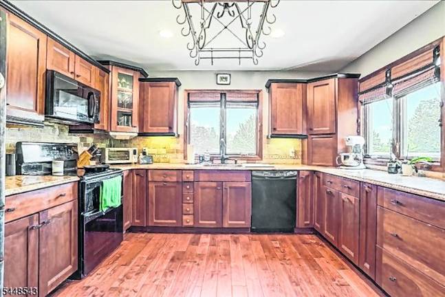 Be charmed by this Lake Mohawk home