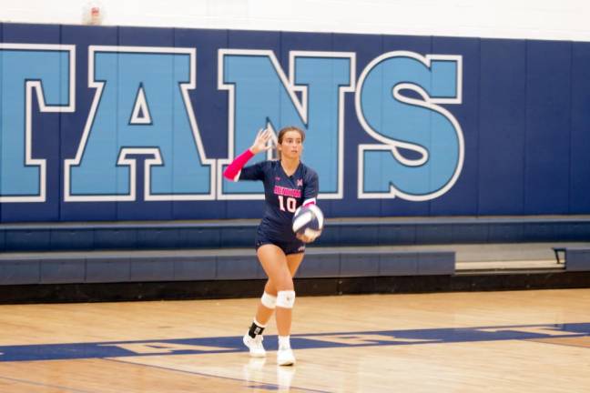Mendham volleyball player Caterina Pisani accomplished one kill, five digs and four service points.