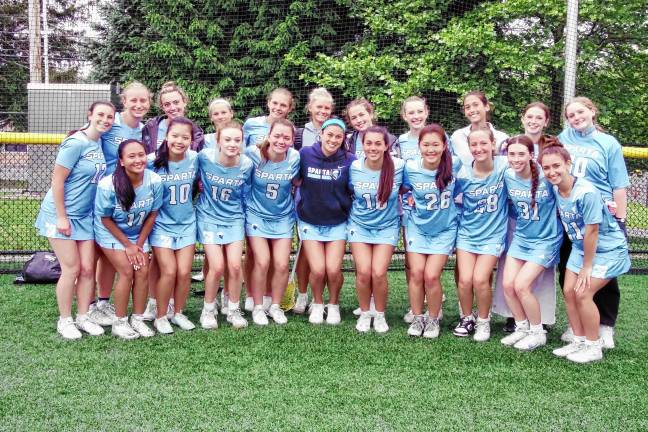The 2025 Sparta High School girls lacrosse team pose after their first-round victory.