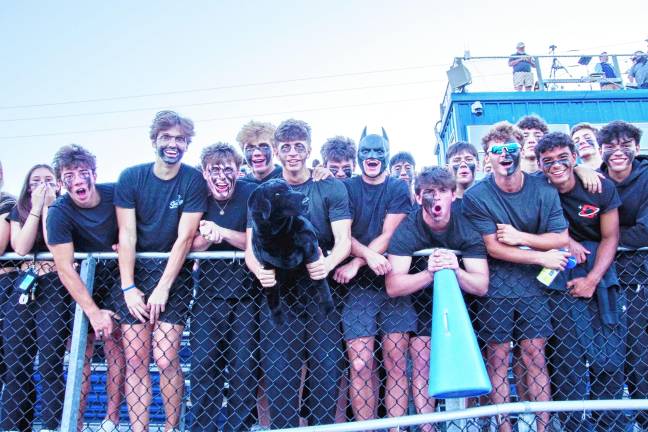 <b>SN6 Dressed in black, Sparta High School football fans are hyped up and ready to cheer for their team.</b>