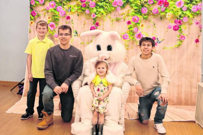 The O’Malleys pose with the Easter Bunny.