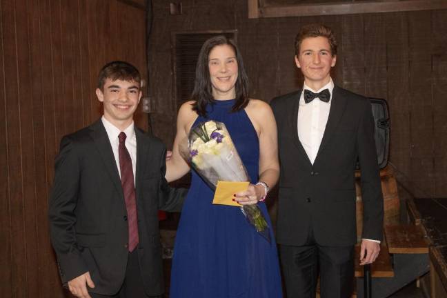 Cadets Tyler Harms, left, and Julian Laznik-Moraghan thank Allyson Wright for being the cadet coordinator.